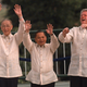 Bill Clinton does the wave clad in a barong tagalog via AP